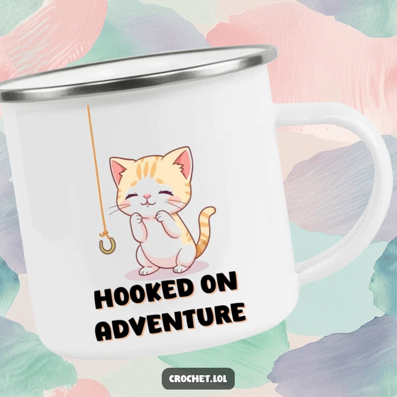 Funny camping mug with a tiny, curious cat character playing with a dangling thread and hook, ideal for outdoor cat-themed enjoyment.