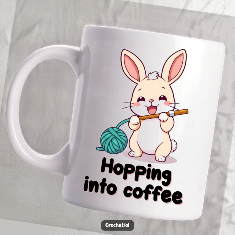 Funny mug showing a small, energetic bunny character happily using a crochet hook to loop yarn with a cheerful expression.