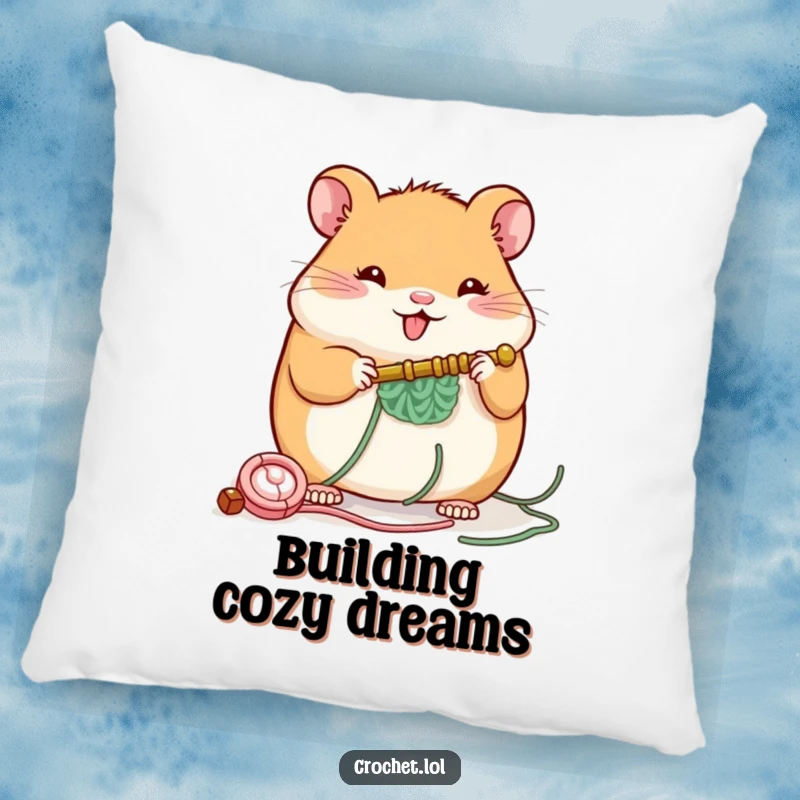 Funny pillow with a plump, cheerful hamster character building a small structure with a crochet hook, providing comfort and amusement.